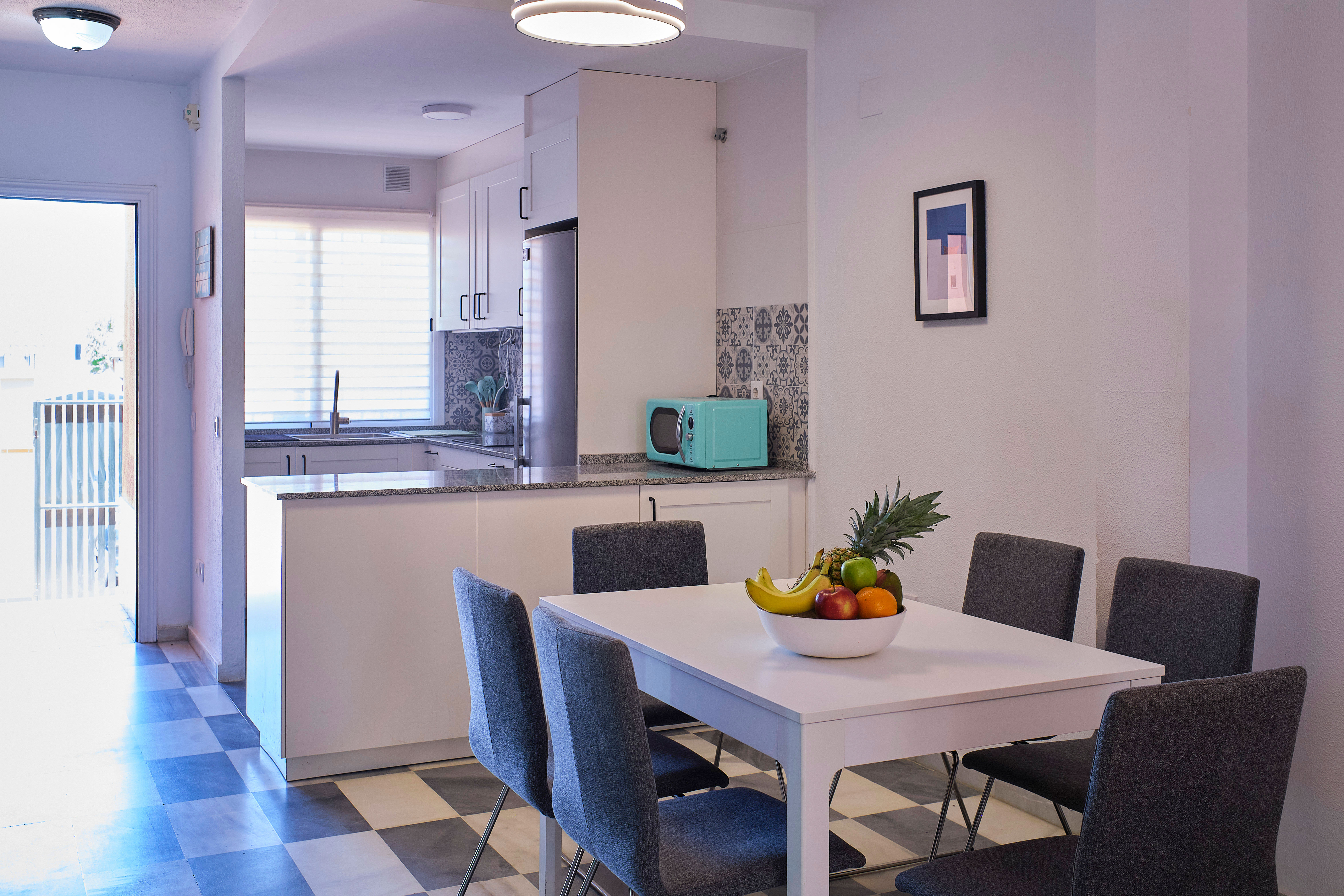 Salón comedor con cocina abierta